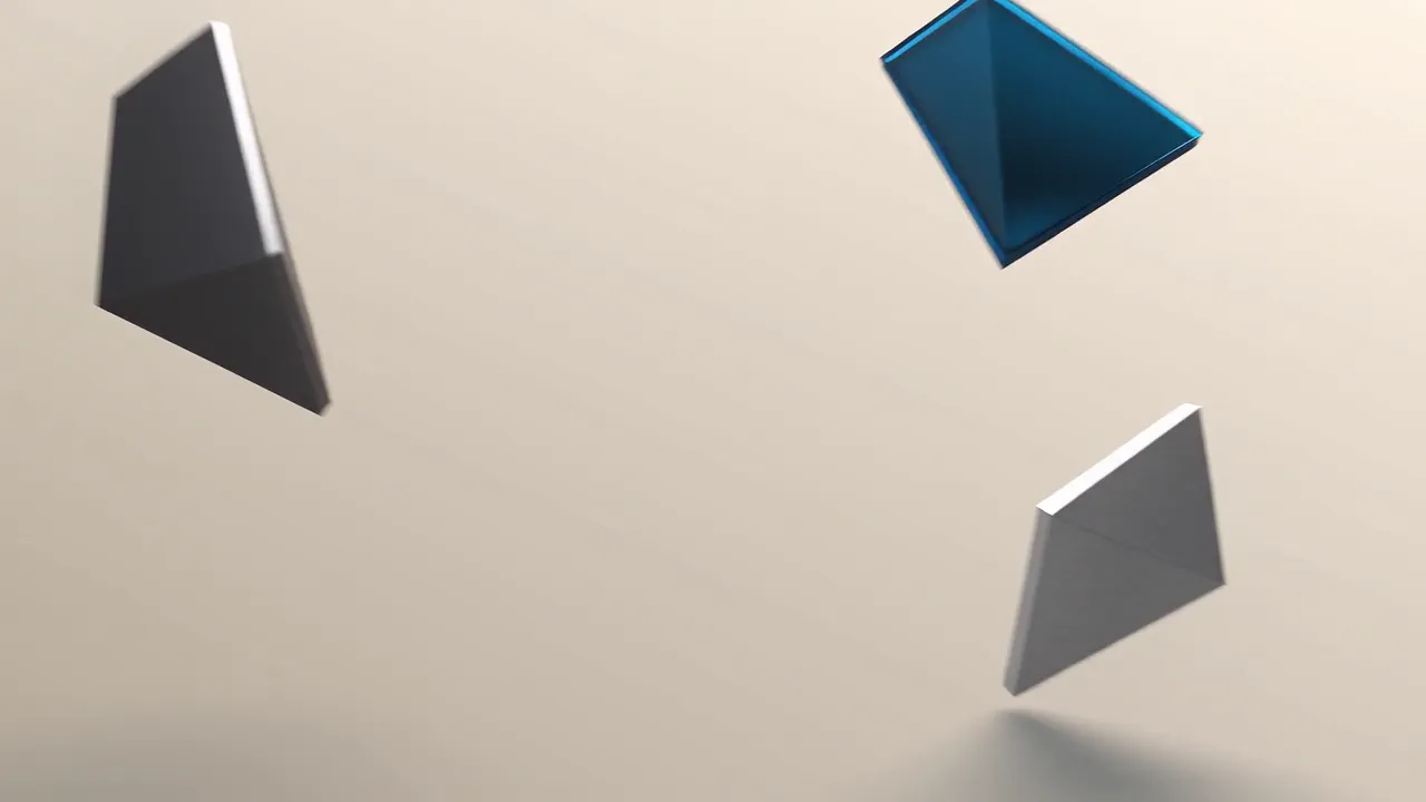Three flat pieces in graphite, blue glass and silver slide in over an ivory ground and lock into an isometric cube