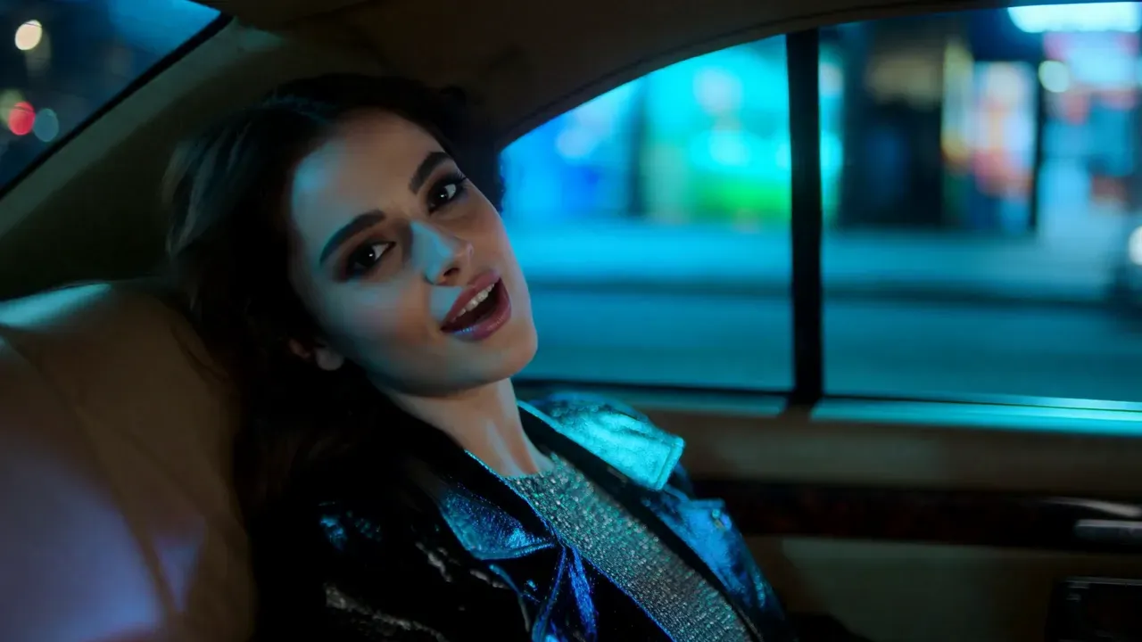 Made with the Music video preset: a neon night drive for a synth pop single, one artist to camera.
